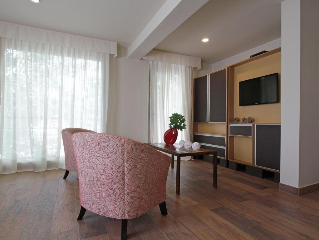 Plaza Paradiso Petit Hotel Чакрас-де-Корія Номер фото